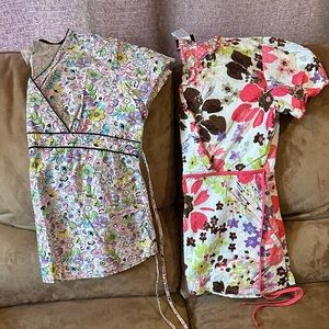 2 Women scrub tops size medium